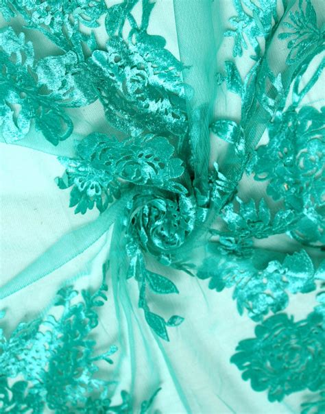 sea green color floral print on net flocking dress material fabric charu creation