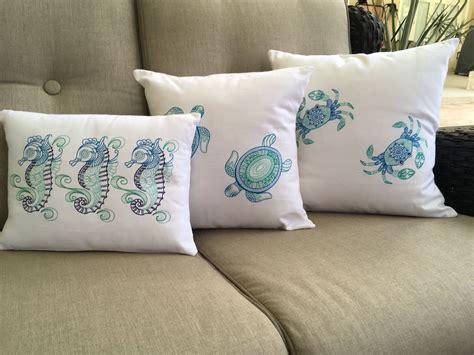 Embroidered Coastal Pillows Found Only At Marcottes Coastal Market In