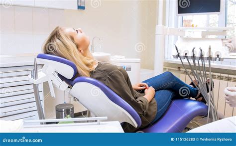 Beautiful Young Woman Lying In Dentist Chair And Waiting For Doctor Stock Image Image Of