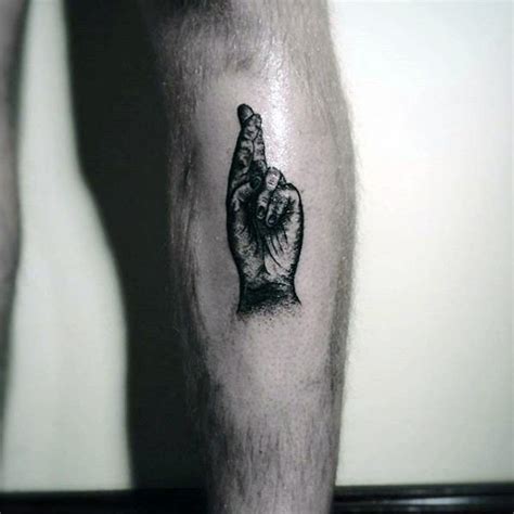 Some others might even include the cross tattoo design within another bigger tattoo design. 50 Fingers Crossed Tattoo Designs For Men - Hand Gesture ...