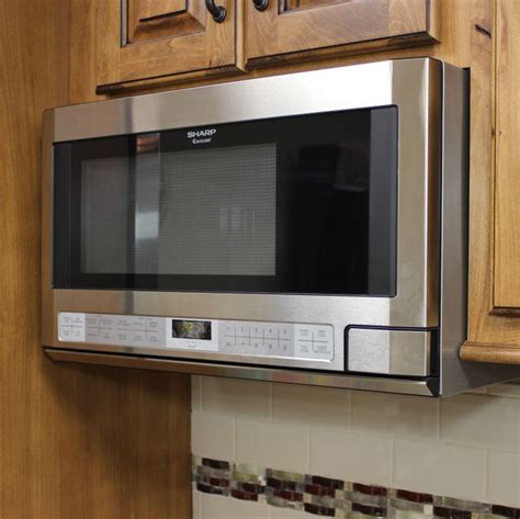 See pictures of rustic kitchen designs and. This Sharp over-the-counter model #microwave allows for a ...