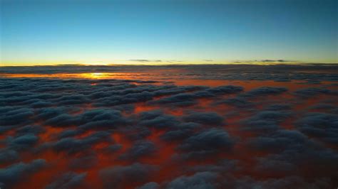 2048x1152 Sunset Above Clouds 2048x1152 Resolution Hd 4k Wallpapers