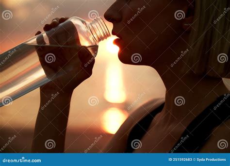 Woman Drinking Water From Bottle On Beach Stock Image Image Of Hand Sunset