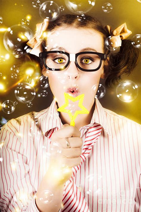 Female Nerd Blowing Bubbles Of Business Success Photograph By Jorgo Photography