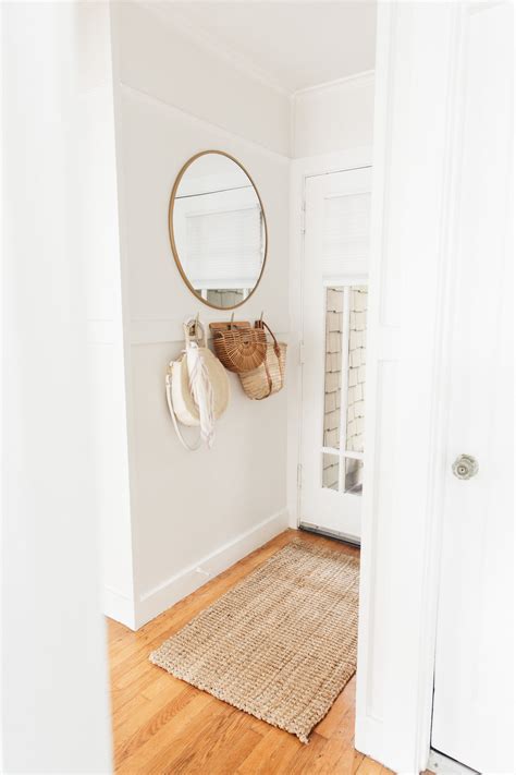 The most common entryway wall mirror material is metal. Glitter Guide: Apartment Tour | Wall mirrors entryway ...