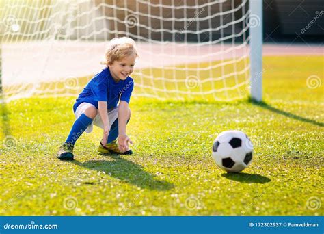 Kids Play Football Child At Soccer Field Stock Image Image Of