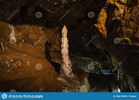 Cave With Stalactites And Stalagmites The Geological Formation Of
