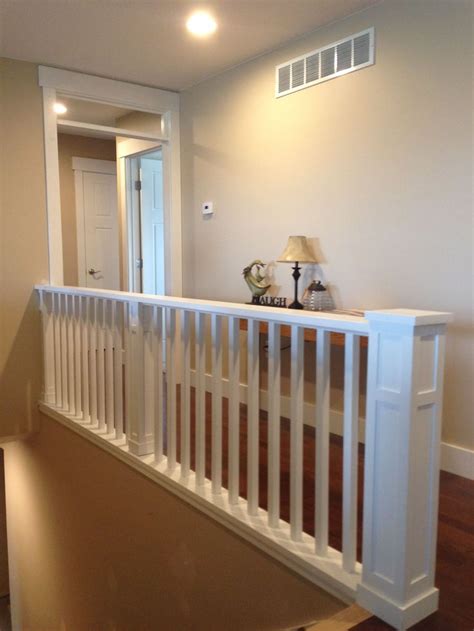 This craftsman style balcony staircase has a custom contemporary