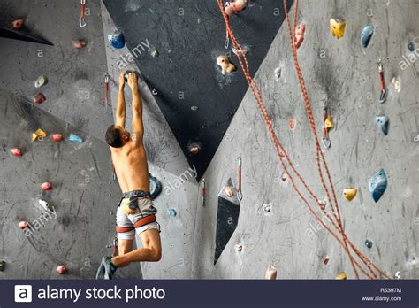 Panoramic Man Bouldering At An Indoor Climbing Centre Stock Photo Alamy