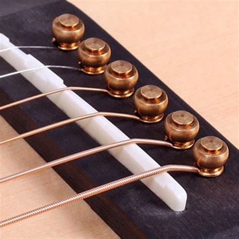 How To Choose The Best Bridge Pins For Acoustic Guitar Fuelrocks