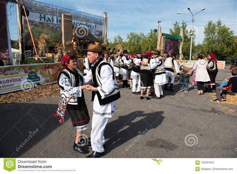 Romanian Folk Dancers Dancing In Traditional Costumes Editorial Image