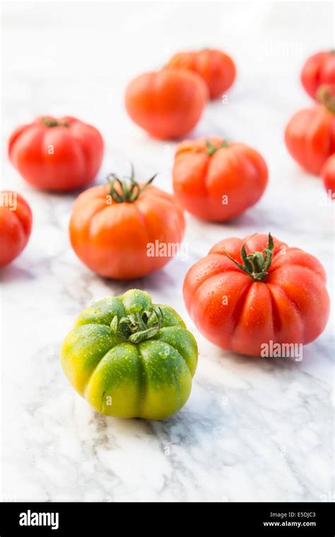 Marinda Tomatoes On Marble Plate Stock Photo Alamy