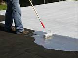 White Flat Roof Coating Photos