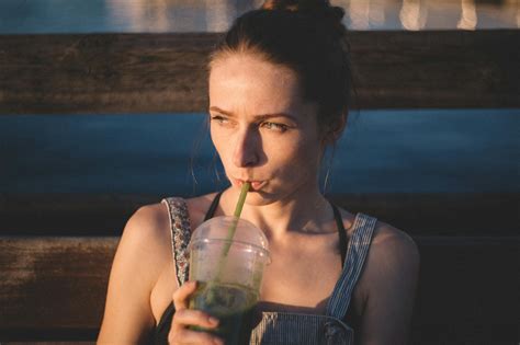 Woman Drinking Sipping On Plastic Cup · Free Stock Photo