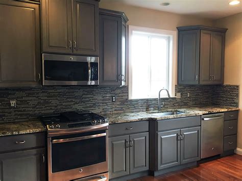 Photos of kitchens with oak cabinets. Kitchen Cabinet Refinishing & Painting | Grande Finale