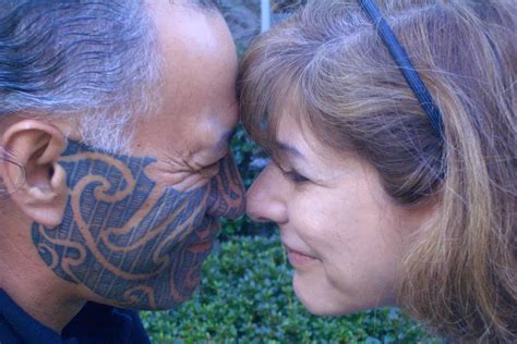 The Hongi Traditional Maori Greeting With The Face Of New Zealand