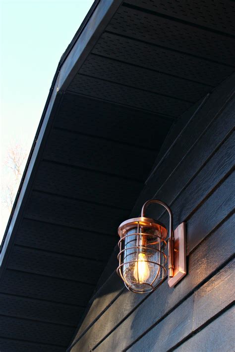Mauvo canyon collection black outdoor seeded glass dusk to dawn wall lantern sconce the mauvo canyon collection features modern the mauvo canyon collection features modern style outdoor lighting with clean, simple lines and decorative craftsman accents. New Copper Outdoor Lights | Garage Makeover Before & After ...