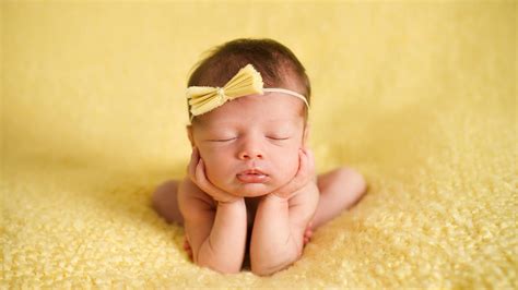 Cute Baby Is Sleeping On Yellow Towel Holding Face With Hands Hd Cute