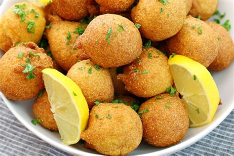 Crispy fried dough balls that go perfectly with a sweet or savory dip and some fried fish. Hush Puppies Food History