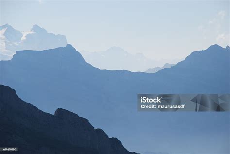 Different Shades Of Blue Mountain View Swiss Alps Stock Photo