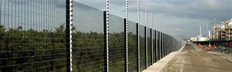 Electric fences deter bears by providing an electric shock when the animal touches the charged wires. High Security Electric Fencing | Simtec Solutions