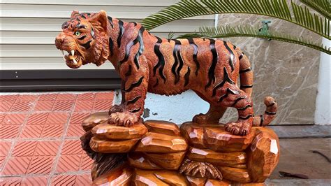 Sculpture Of A Tiger Standing On A Rocky Mountain TUAN WOOD CARVINGS