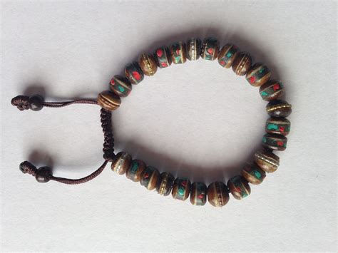 brown yak bone bracelet with turquoise coral and copper 8mm serenity tibet singing bowls