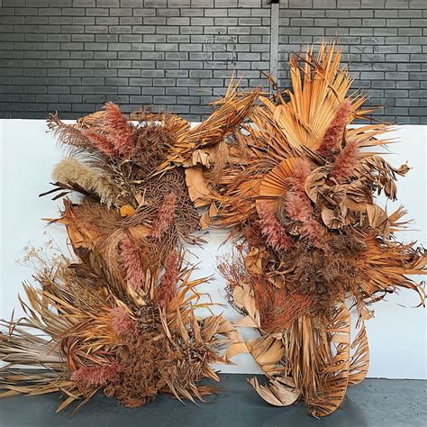 Anyone have specific suggestions on fake flowers to put on our dining room table? Trend Alert! Creative Ways to Use Dried Palms in Weddings ...