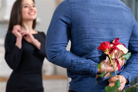 free photo man surprising his wife with a valentine s day t close up