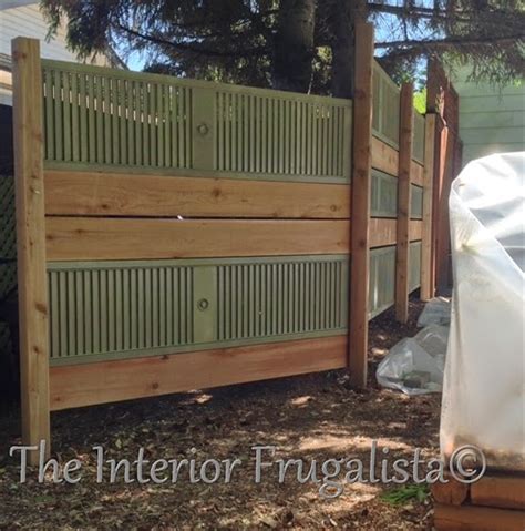 The shelves can be used to show off photos, store books, or even display fresh flowers. Old Louvered Doors Repurposed Into Garden Screen | The ...