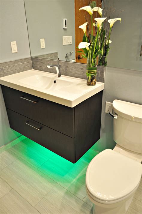 Then, put a coordinating towel ring near the sink so that a hand towel is always within easy reach. Another bathroom completed! A floating vanity with under ...