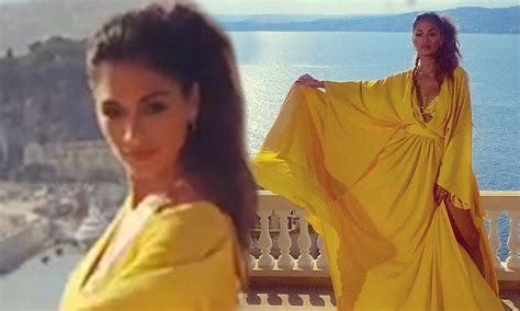 Nicole Scherzinger Shows Off Some Leg In Floaty Yellow Dress In France