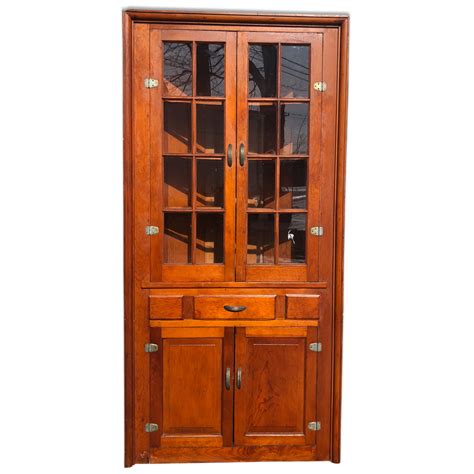 You'll have to carefully measure your wall space and settle on the order in which you'll arrange the cabinets. Antique Farmhouse Pine Corner Cabinet with Glass Doors ...
