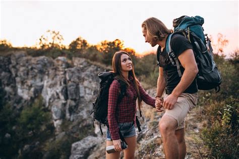 Free Photo Couple Hiking In Mountains