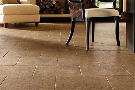 Vinyl tiles are generally large, however you can have your tile custom cut to specific dimensions. Vinyl Floor Tiles, Flooring Installation, Vinyl Flooring in Abu Dhabi
