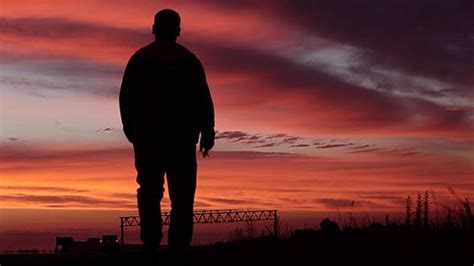 Lonely Man Goes Along The Road Against Sunset Stock Footage Videohive