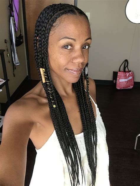 Feathery, flippy hair of the '70s has made its way back into modern circles, with swoopy curtain bangs paving the way. Center part 70's style Cornrows | Black girl braids, Hair ...