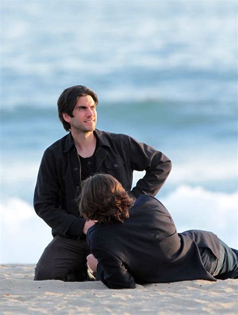 snapped christian bale and wes bentley roughhouse on the beach in santa monica in scenes for movie