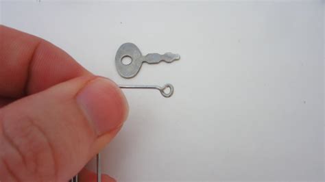 Once your paper clip or coat hanger is in the lock, carefully turn it by taking advantage of the bend and using it as a handle. How to Pick Simple Locks/Latches With a Paper Clip : 6 ...