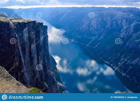 Wonderful Mountain Landscape Of Lysefjorden With Clouds Reflected In