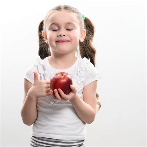 Red Apple And Little Girl Portrait Of A Child On A White Background