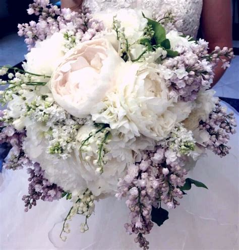 bridal bouquet peonies lilacs freesias lily of the valley