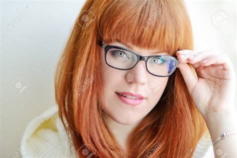 Redhead Girl With Glasses