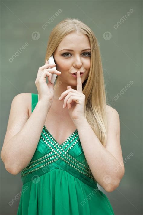 Portrait Of Attractive Girl With Finger On Lips Photo Background And Picture For Free Download