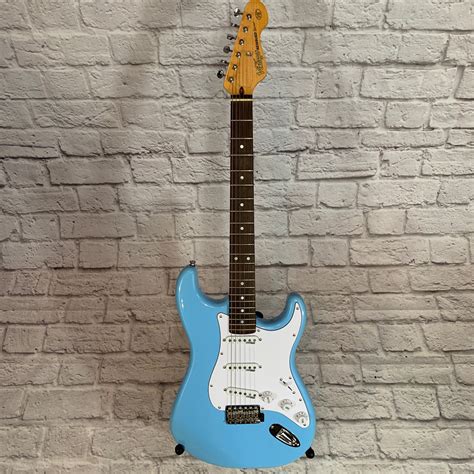 Vintage V6lb Light Blue S Style Electric Guitar Evolution Music