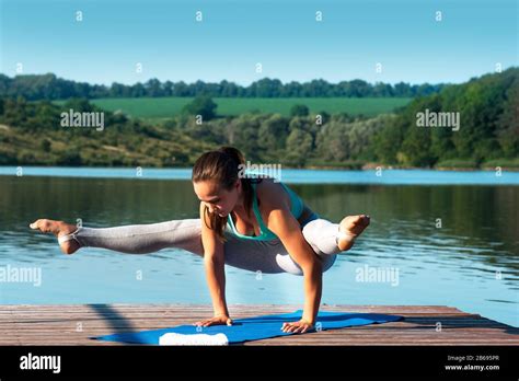 Yoga Pose Tittibhasana Beautiful Girl Doing Handstand On The