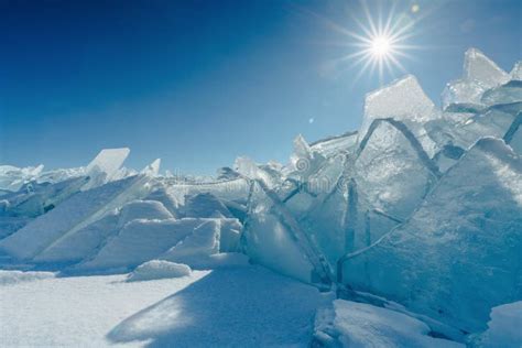 View On And Through Ice On Frozen Fields Of Lake Baikal Stock Photo