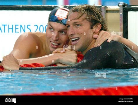 dpa from l dutch pieter van den hoogenband congratulates australian swimmer ian thorpe