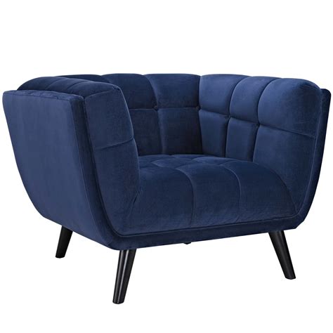 Includes coffee table, vase, and flowers. Bestow 2 Piece Velvet Sofa and Armchair Set Navy