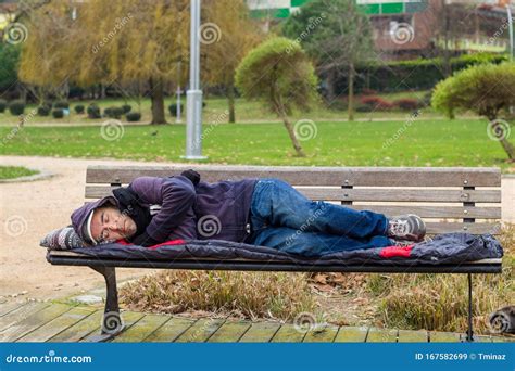 Homeless Man Sleeping On Bench At Park Stock Image Image Of Drunk